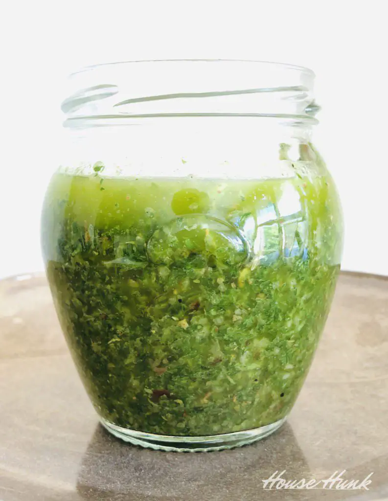 chimichurri sauce in a glass jar