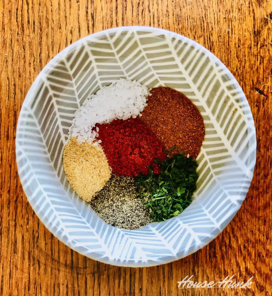 parsley, black pepper, paprika, garlic powder, cayenne pepper, and salt in a bowl