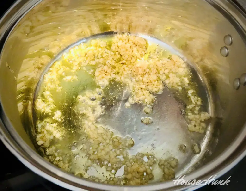 sautéed garlic in a saucepan