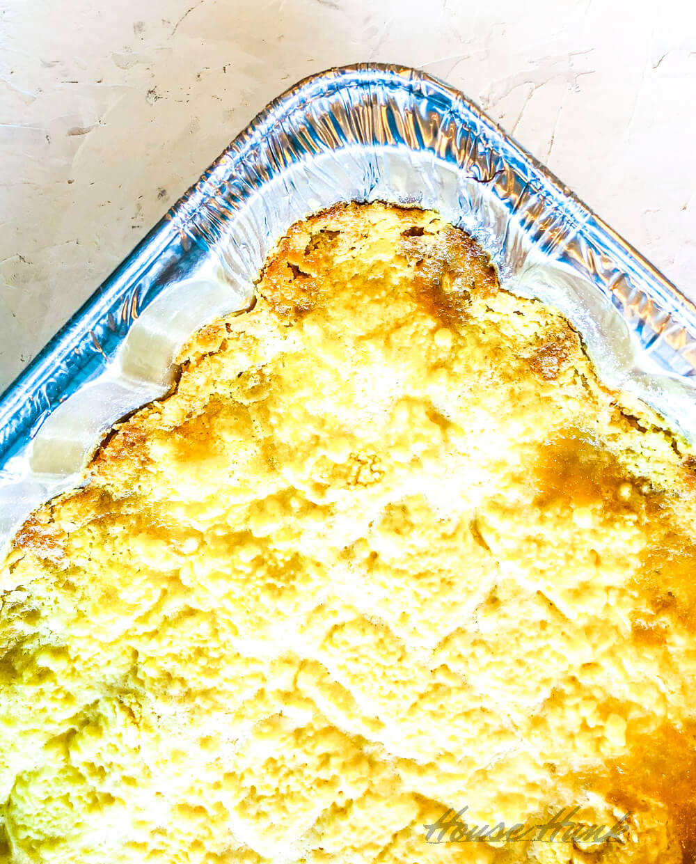 A tray of golden Oreo dump cake.