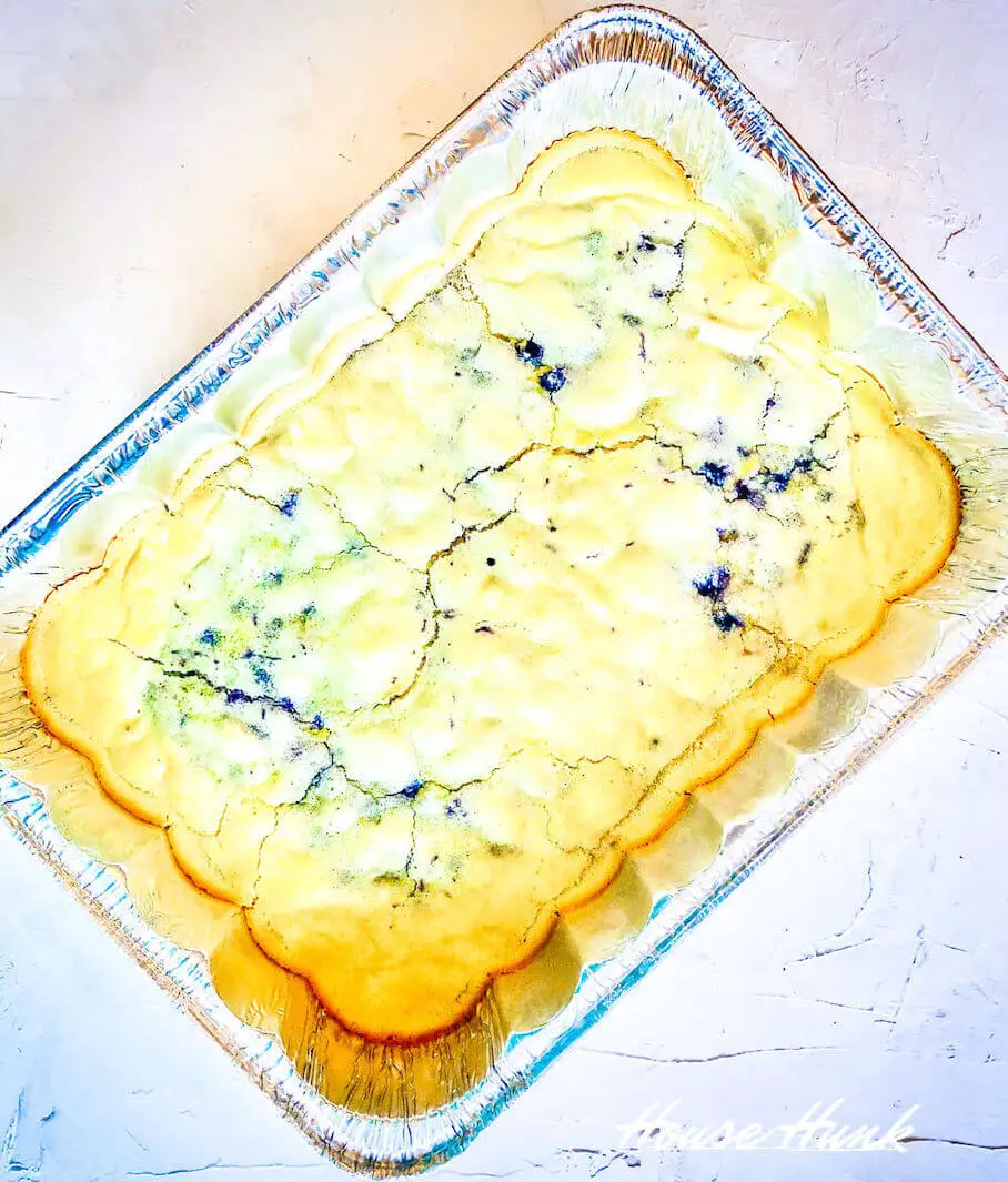 Lemon blueberry sheet pan pancakes in and aluminum tray.