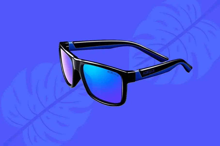 A pair of black sunglasses with blue reflective lenses and a logo on a blue leafy background