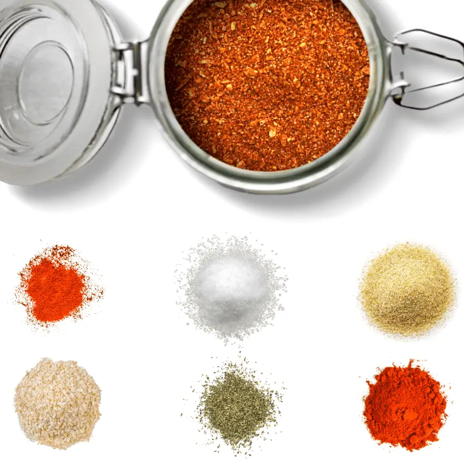 A photo of a glass jar of spice mix surrounded by piles of different spices on a white background.