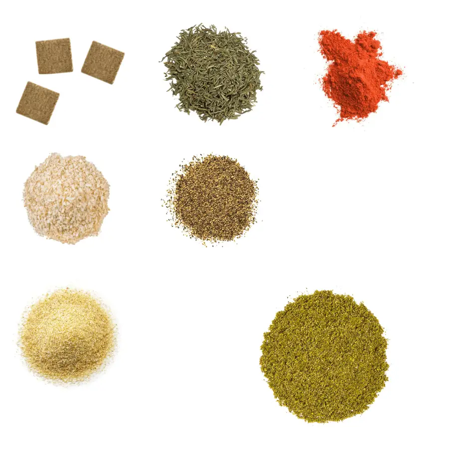 A photorealistic image of ingredients for Homemade Smoked Peppercorn Sage Rub consisting of seven piles of different spices and herbs on a white background.