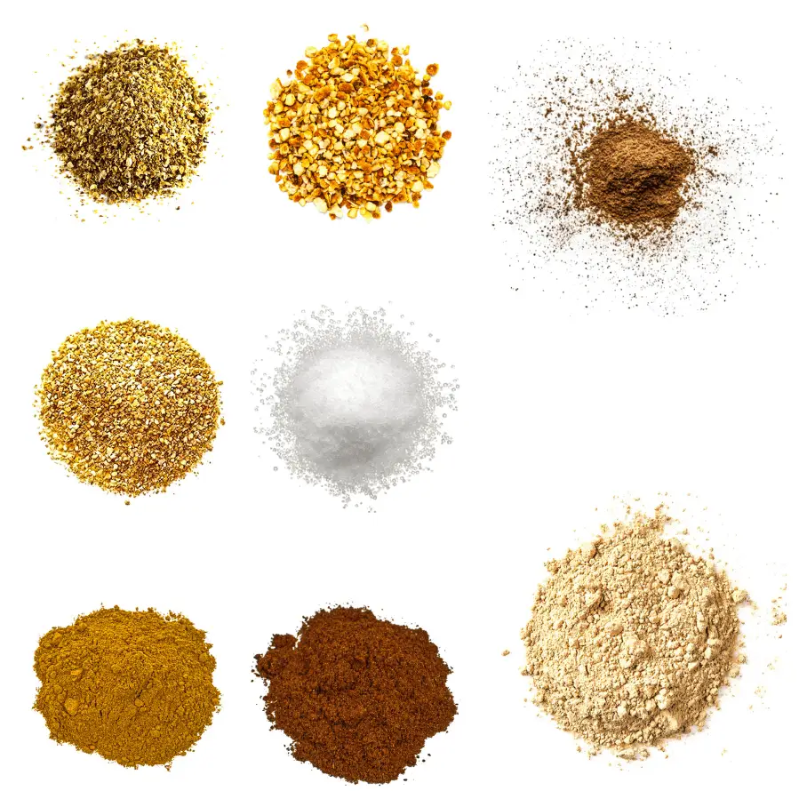 A photorealistic image of ingredients for Homemade Citrus and Ginger Spice Blend consisting of eight piles of different spices and herbs on a white background.