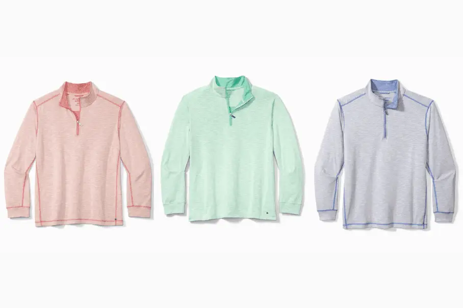 Three Tommy Bahama Rialto Beach Islandzone Half-zip Sweatshirts in light, light blue, and peach on a white background.