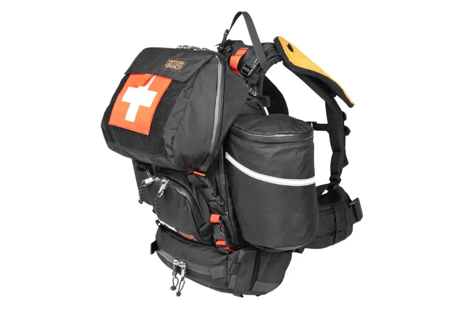 A black Mystery Ranch SHIFT Pack on a white background