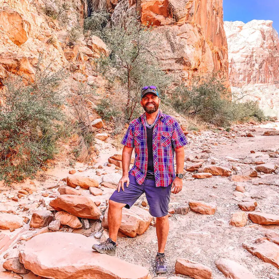 Man hiking through the Grand Wash section of Capitol Reef National Park