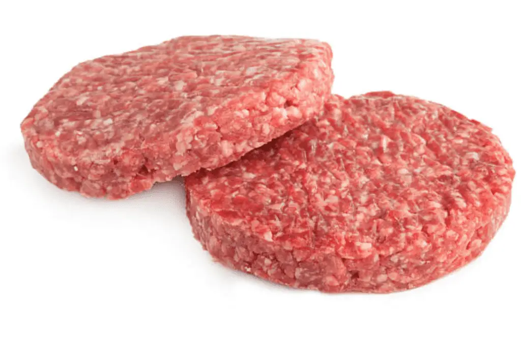 Two raw lamb burger patties on a white background.