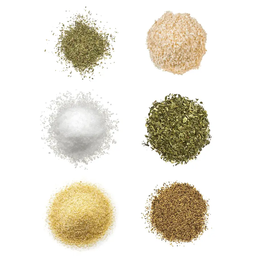 A photorealistic image of ingredients for Homemade Balsamic Vinegar Seasoning consisting of six piles of different spices and herbs on a white background.