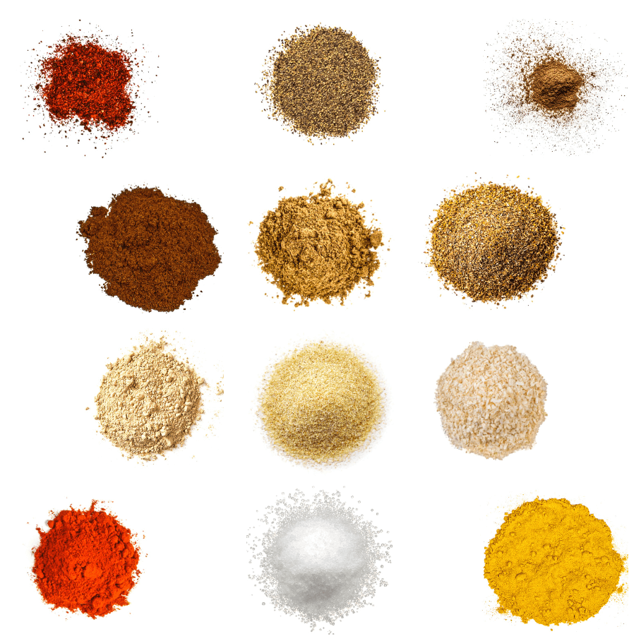 A photorealistic image of ingredients for Homemade Chicken Tandoori Seasoning consisting of twelve piles of different spices and herbs on a white background.