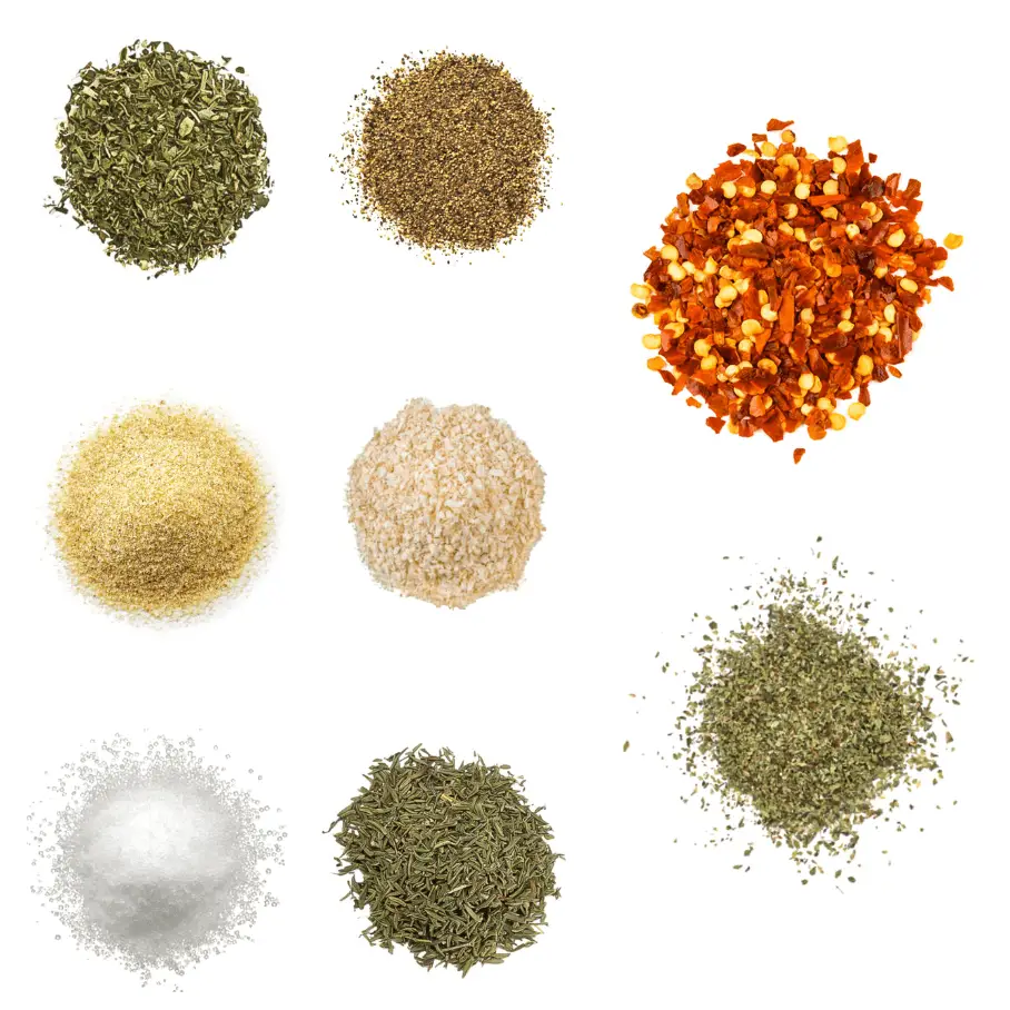 A photorealistic image of ingredients for Homemade Pasta Seasoning consisting of eight piles of different spices and herbs on a white background.