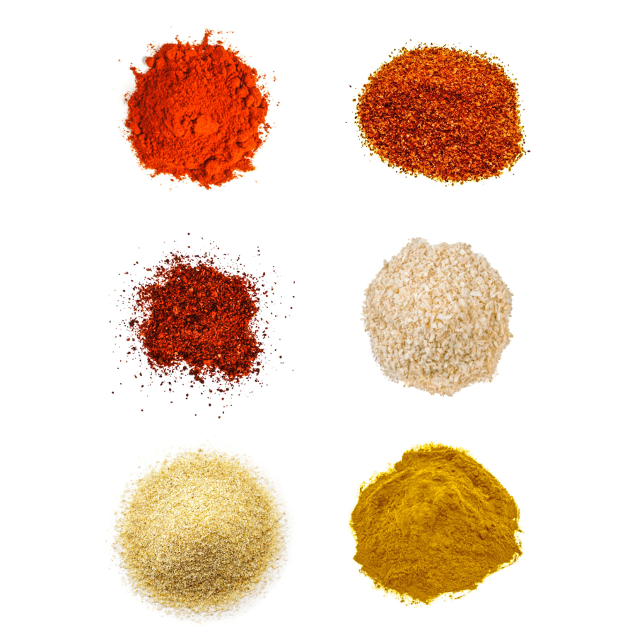 A photorealistic image of ingredients for Seafood Boil Seasoning consisting of six piles of different spices and herbs on a white background.