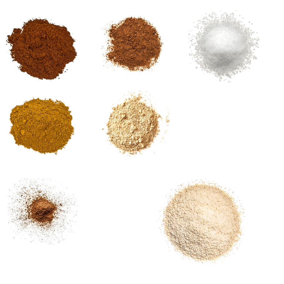 A photorealistic image of ingredients for Homemade Honey Seasoning consisting of seven piles of different spices and herbs on a white background.