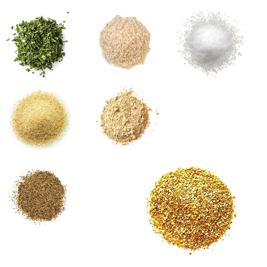 A grid of seven spices on a white background, with the center spot empty, including salt, garlic powder, onion powder, and black pepper.