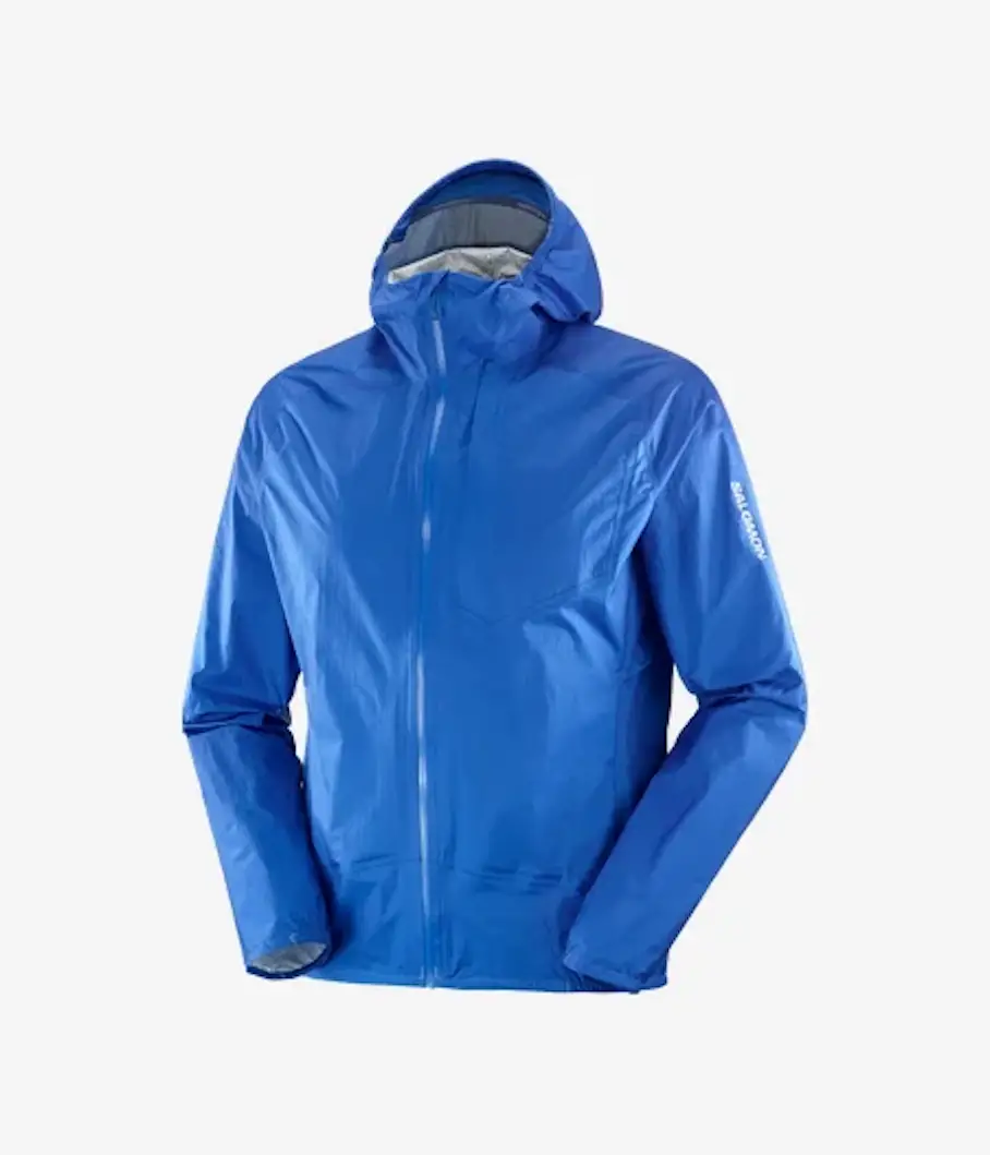 A blue rain jacket with a hood, a zipper, two zippered pockets, and a Salomon logo on the right arm. The jacket is waterproof and shown from the front on a white background.